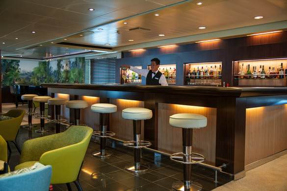 Paul Gauguin Cruises MS Paul Gauguin Piano Bar 4 ©Paul Gauguin Cruises.jpg